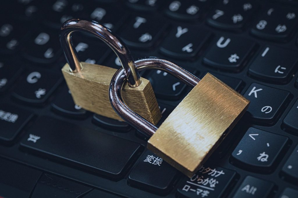 Padlocks on a keyboard representing security